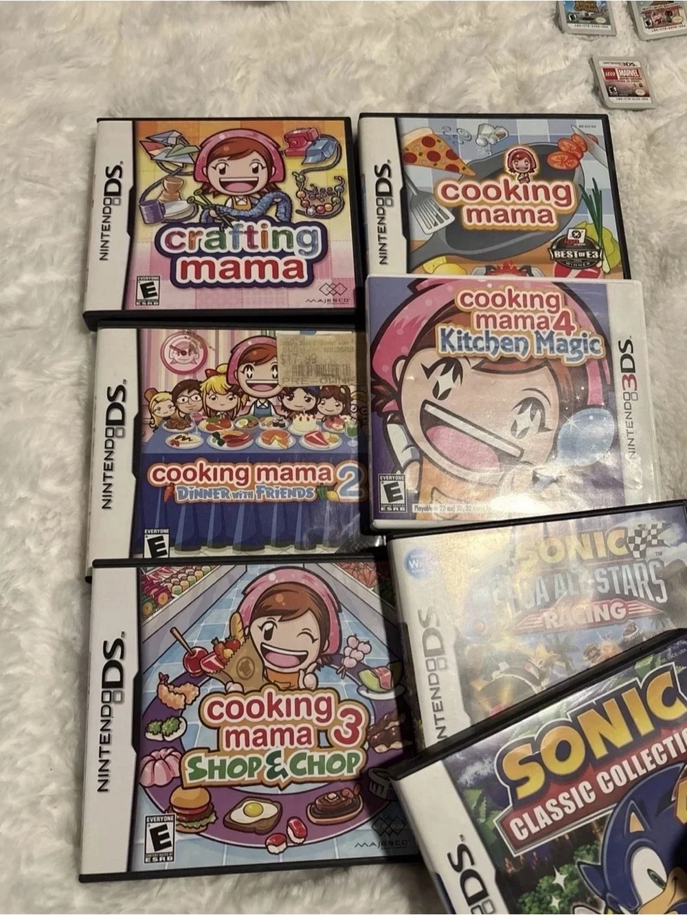 Nintendo Hello Kitty DS Bundle with Blue Handheld & Red-Accented Case